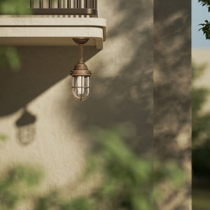 Industrial outdoor brass lamp with protective cage and glass, vintage nautical style for outdoor lighting by Ghidini 1849 - Finish: OAS Antique Brass