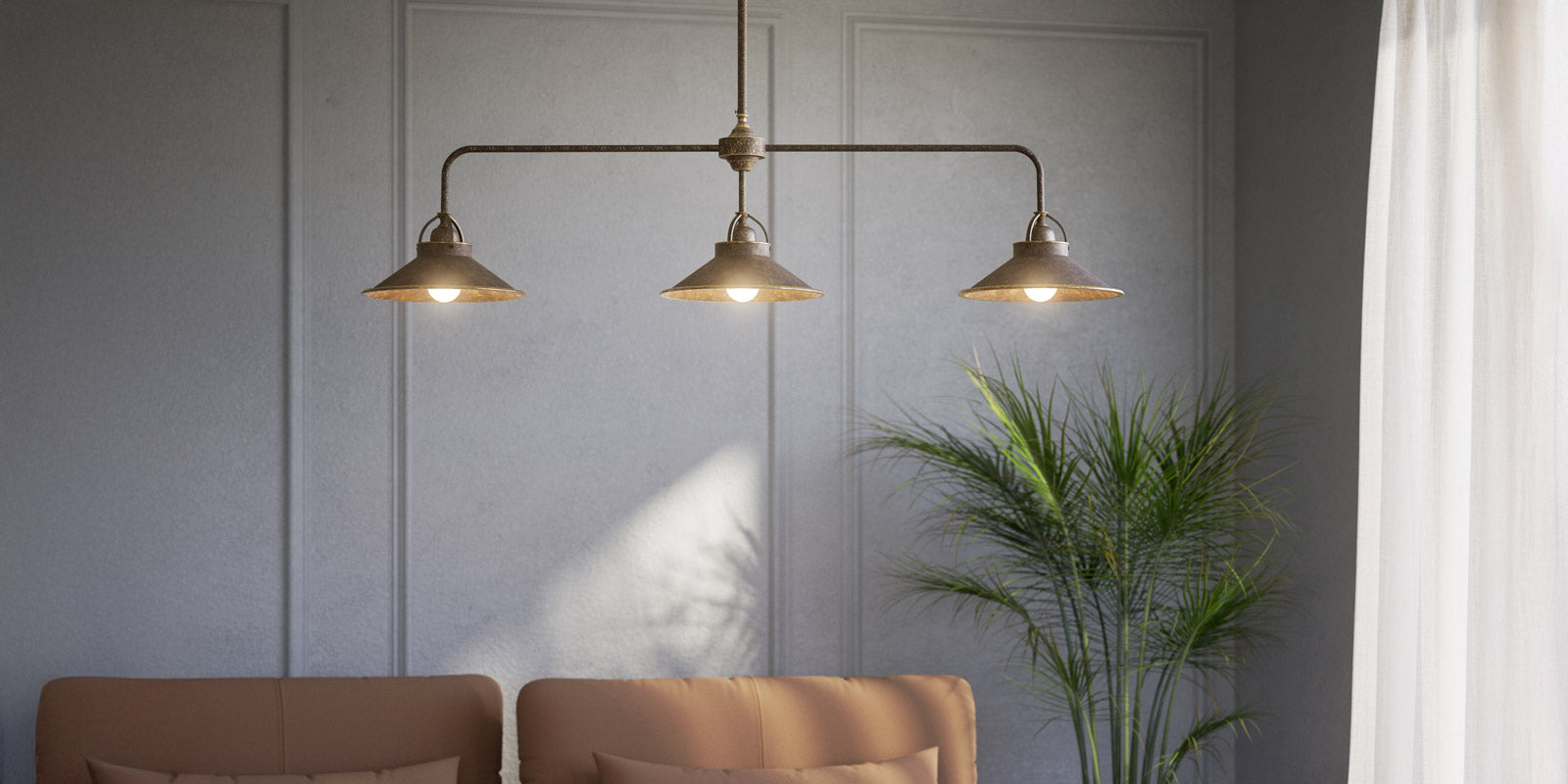 Ghidini 1849 rustic brass lamps collection cover, featuring a vintage-inspired three-light pendant lamp in an elegant living space with warm tones and soft lighting.