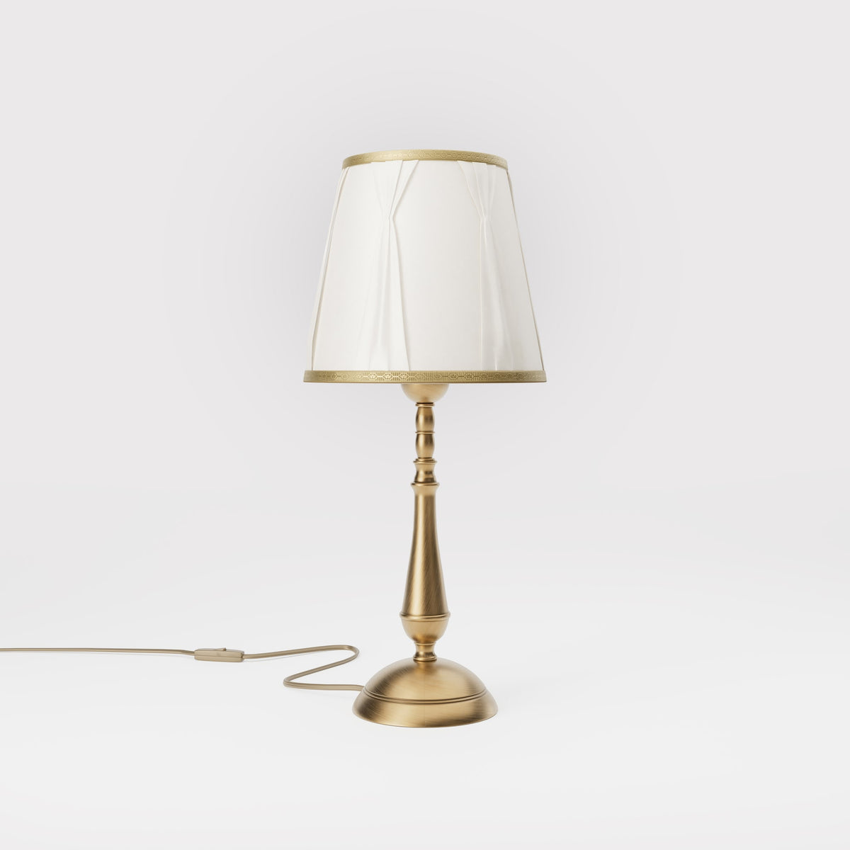 Classic brass table lamp with ivory fabric shade and decorative trims, round base and turned stem by Ghidini 1849 - Dimension/Finish: Medium / OBS Bronze Satin Brass