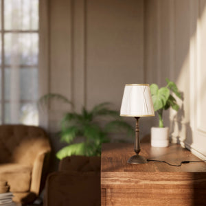 Classic brass table lamp with ivory fabric shade and decorative trims, round base and turned stem by Ghidini 1849 - Dimension/Finish: Medium / OBM Bronze Satin Matt Brass