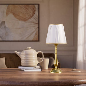 Classic brass table lamp with ivory fabric shade and decorative trims, round base and turned stem by Ghidini 1849 - Dimension/Finish: Medium / OLV Polished Brass