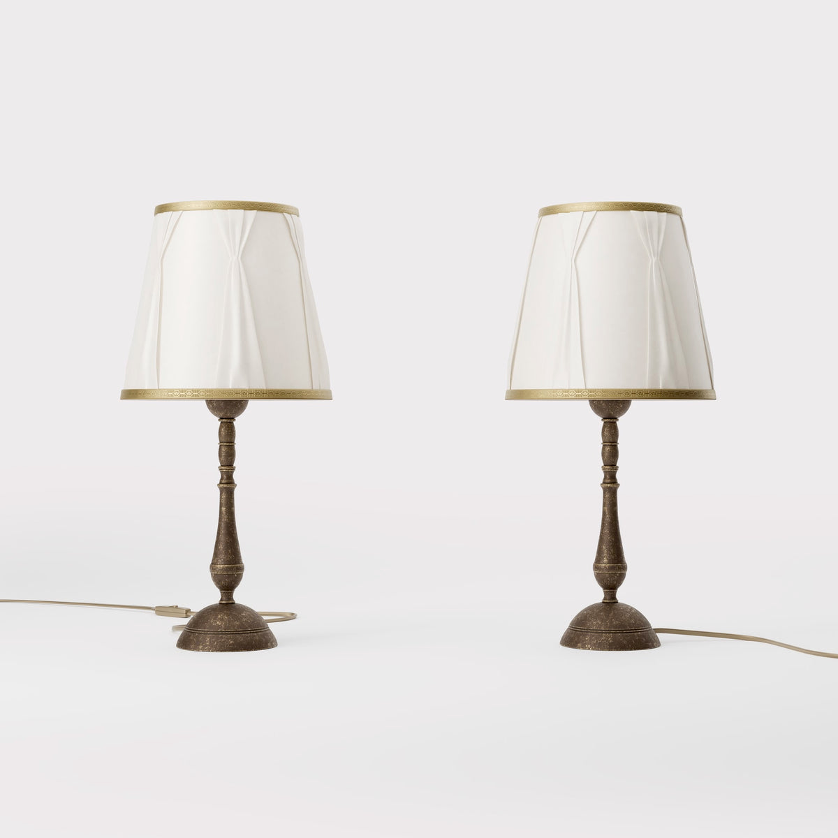 Classic brass table lamp with ivory fabric shade and decorative trims, round base and turned stem by Ghidini 1849 - Dimension/Finish: Small / OAS Antique Brass