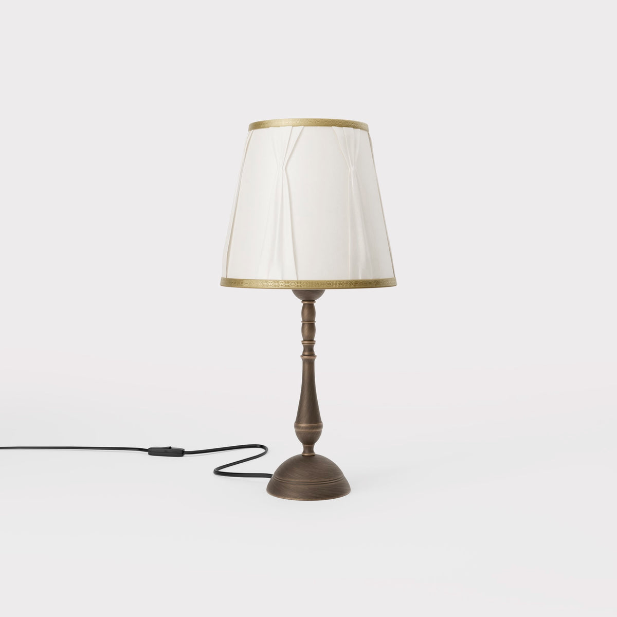 Classic brass table lamp with ivory fabric shade and decorative trims, round base and turned stem by Ghidini 1849 - Dimension/Finish: Small / OBM Bronze Satin Matt Brass